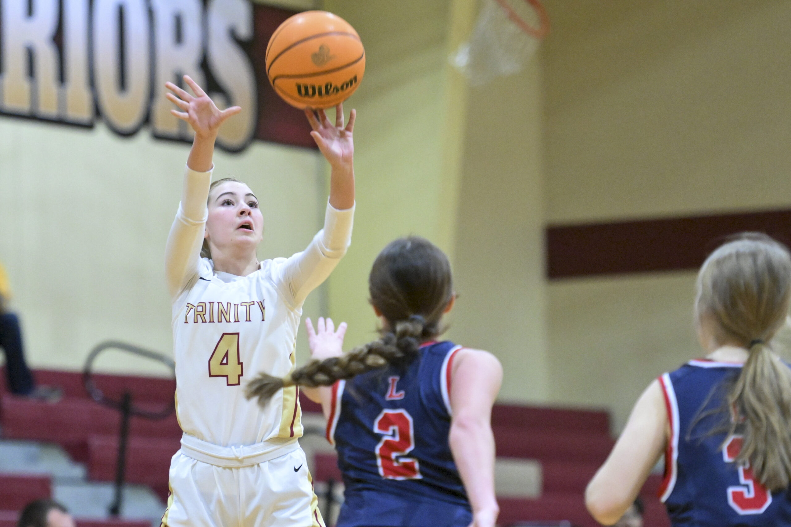 Baldy becomes Warriors' winningest coach as Trinity tops Liberty 73-52